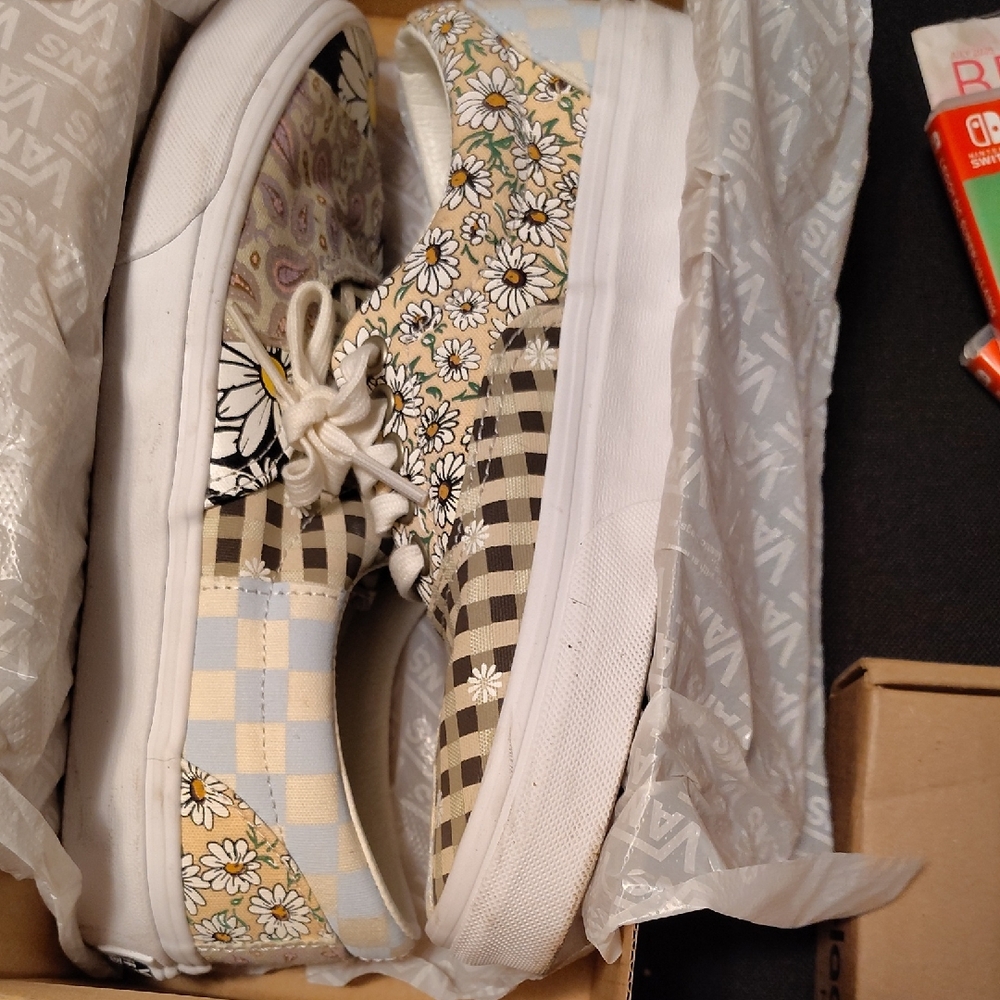 Vans Black and White Sneakers with Iconic Style